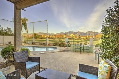 Discover luxurious living in this elegant 5-bedroom+den on El Conquistador Country Club - Conquistador in Arizona - for sale on GolfHomes.com, golf home, golf lot