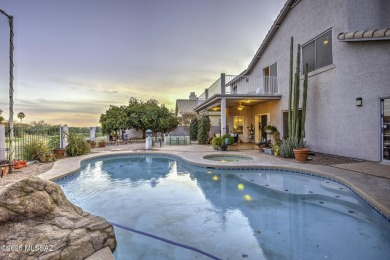 Discover luxurious living in this elegant 5-bedroom+den on El Conquistador Country Club - Conquistador in Arizona - for sale on GolfHomes.com, golf home, golf lot