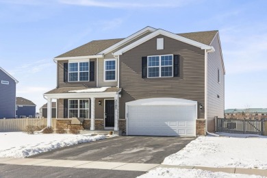 This spacious 4-bedroom + den, 2.5-bath home sits on a fenced-in on Blackberry Oaks Golf Course in Illinois - for sale on GolfHomes.com, golf home, golf lot