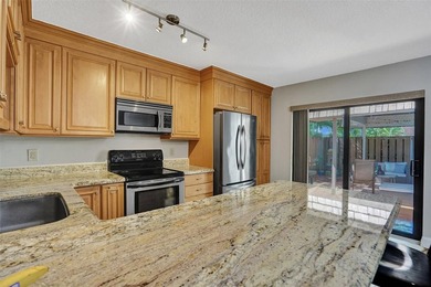 Beautiful 3 bedroom, 2.5 bath townhome in the sought after on Pine Island Ridge Country Club in Florida - for sale on GolfHomes.com, golf home, golf lot