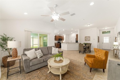 This Charming home is situated in the highly sought-after Gated on Miona Lake Golf Club in Florida - for sale on GolfHomes.com, golf home, golf lot