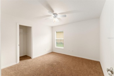 This Charming home is situated in the highly sought-after Gated on Miona Lake Golf Club in Florida - for sale on GolfHomes.com, golf home, golf lot