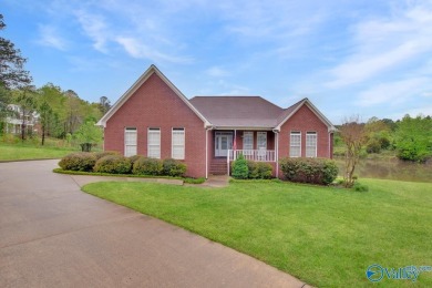 Discover the charm of this custom home that overlooks the lake on Cherokee Ridge Country Club in Alabama - for sale on GolfHomes.com, golf home, golf lot