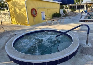 Situated Right across from the Community Pool and Clubhouse on Riverwood Golf Club in Florida - for sale on GolfHomes.com, golf home, golf lot