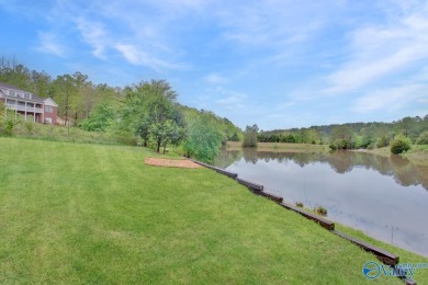 Discover the charm of this custom home that overlooks the lake on Cherokee Ridge Country Club in Alabama - for sale on GolfHomes.com, golf home, golf lot