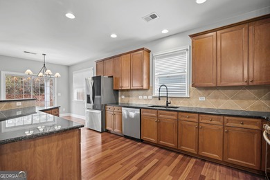 BEAUTIFUL AND SPACIOUS 5 BR HOME IN CHOICE SUMMERGROVE COMMUNITY on Summergrove Golf Club in Georgia - for sale on GolfHomes.com, golf home, golf lot