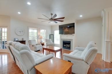 Discover the charm of this custom home that overlooks the lake on Cherokee Ridge Country Club in Alabama - for sale on GolfHomes.com, golf home, golf lot