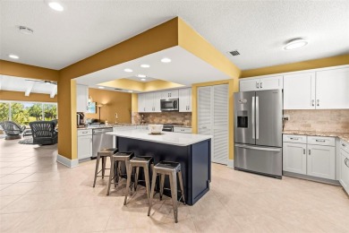 WHAT AN AMAZING HIGH END REMODEL WITH NOTHING  LEFT UNDONE on Bardmoor Golf and Tennis Club in Florida - for sale on GolfHomes.com, golf home, golf lot