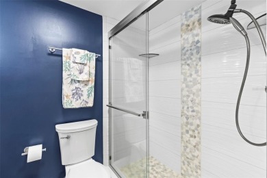 WHAT AN AMAZING HIGH END REMODEL WITH NOTHING  LEFT UNDONE on Bardmoor Golf and Tennis Club in Florida - for sale on GolfHomes.com, golf home, golf lot