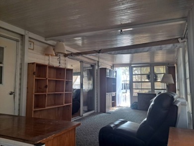 Situated Right across from the Community Pool and Clubhouse on Riverwood Golf Club in Florida - for sale on GolfHomes.com, golf home, golf lot