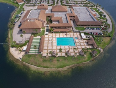 Beautifully Renovated 2-Bedroom Condo with Pool View - Century on Flamingo Lakes Country Club in Florida - for sale on GolfHomes.com, golf home, golf lot