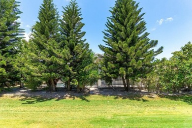 This expansive, custom-built estate offers luxurious on Bocaire Country Club in Florida - for sale on GolfHomes.com, golf home, golf lot