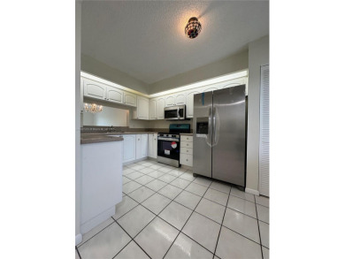 Beautifully Renovated 2-Bedroom Condo with Pool View - Century on Flamingo Lakes Country Club in Florida - for sale on GolfHomes.com, golf home, golf lot