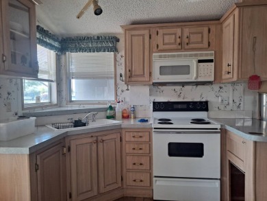 Situated Right across from the Community Pool and Clubhouse on Riverwood Golf Club in Florida - for sale on GolfHomes.com, golf home, golf lot