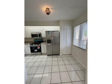 Beautifully Renovated 2-Bedroom Condo with Pool View - Century on Flamingo Lakes Country Club in Florida - for sale on GolfHomes.com, golf home, golf lot
