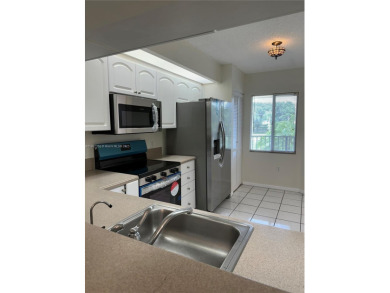 Beautifully Renovated 2-Bedroom Condo with Pool View - Century on Flamingo Lakes Country Club in Florida - for sale on GolfHomes.com, golf home, golf lot