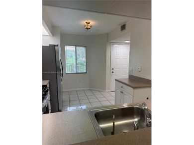 Beautifully Renovated 2-Bedroom Condo with Pool View - Century on Flamingo Lakes Country Club in Florida - for sale on GolfHomes.com, golf home, golf lot