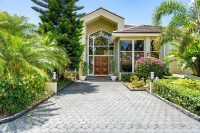 This expansive, custom-built estate offers luxurious on Bocaire Country Club in Florida - for sale on GolfHomes.com, golf home, golf lot