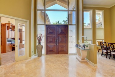 This expansive, custom-built estate offers luxurious on Bocaire Country Club in Florida - for sale on GolfHomes.com, golf home, golf lot