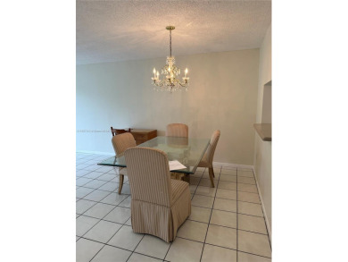 Beautifully Renovated 2-Bedroom Condo with Pool View - Century on Flamingo Lakes Country Club in Florida - for sale on GolfHomes.com, golf home, golf lot