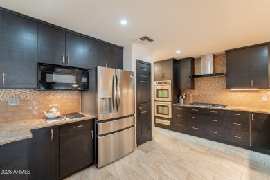 This beautifully updated home is nestled on a quiet cul-de-sac on The Duke At Rancho El Dorado Golf Course in Arizona - for sale on GolfHomes.com, golf home, golf lot