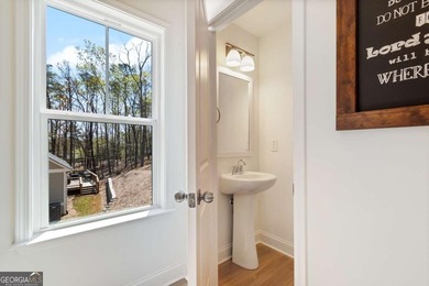 Peaceful living in Lake Arrowhead...move-in ready! Come see this on The Highlands Course at Lake Arrowhead in Georgia - for sale on GolfHomes.com, golf home, golf lot