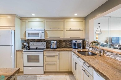 This beautifully updated 2/2 condo is located in a vibrant 55+ on Inverrary Country Club in Florida - for sale on GolfHomes.com, golf home, golf lot