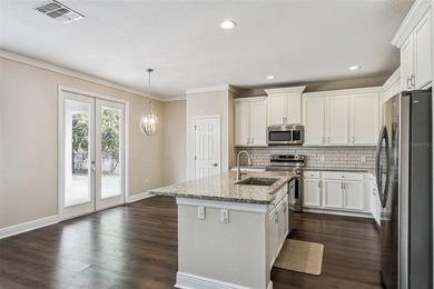 Located in the gated golf community of Eagle Creek, this move-in on Eagle Creek Golf Club in Florida - for sale on GolfHomes.com, golf home, golf lot