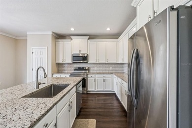 Located in the gated golf community of Eagle Creek, this move-in on Eagle Creek Golf Club in Florida - for sale on GolfHomes.com, golf home, golf lot