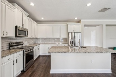 Located in the gated golf community of Eagle Creek, this move-in on Eagle Creek Golf Club in Florida - for sale on GolfHomes.com, golf home, golf lot