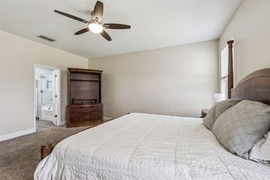 Located in the gated golf community of Eagle Creek, this move-in on Eagle Creek Golf Club in Florida - for sale on GolfHomes.com, golf home, golf lot