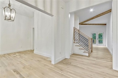 This stunning new construction blends luxury, functionality, and on The Highlands Course at Lake Arrowhead in Georgia - for sale on GolfHomes.com, golf home, golf lot