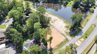 Exceptional opportunity to own a partially wooded lot featuring on Diamondhead Country Club in Mississippi - for sale on GolfHomes.com, golf home, golf lot