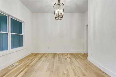 This stunning new construction blends luxury, functionality, and on The Highlands Course at Lake Arrowhead in Georgia - for sale on GolfHomes.com, golf home, golf lot