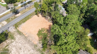 Exceptional opportunity to own a partially wooded lot featuring on Diamondhead Country Club in Mississippi - for sale on GolfHomes.com, golf home, golf lot