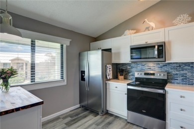 Step into paradise, this stunning 2B/2B luxury condo nestled in on Pelican Pointe 9 Hole Course in Florida - for sale on GolfHomes.com, golf home, golf lot