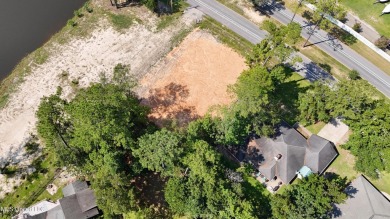 Exceptional opportunity to own a partially wooded lot featuring on Diamondhead Country Club in Mississippi - for sale on GolfHomes.com, golf home, golf lot