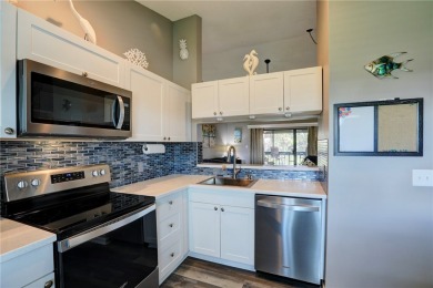 Step into paradise, this stunning 2B/2B luxury condo nestled in on Pelican Pointe 9 Hole Course in Florida - for sale on GolfHomes.com, golf home, golf lot