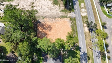 Exceptional opportunity to own a partially wooded lot featuring on Diamondhead Country Club in Mississippi - for sale on GolfHomes.com, golf home, golf lot