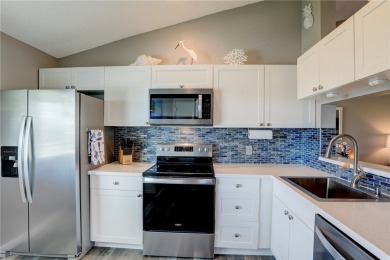 Step into paradise, this stunning 2B/2B luxury condo nestled in on Pelican Pointe 9 Hole Course in Florida - for sale on GolfHomes.com, golf home, golf lot