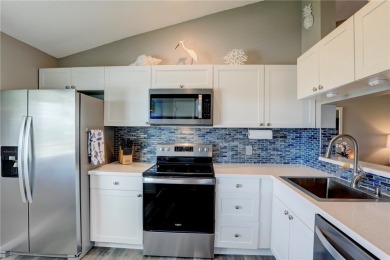 Step into paradise, this stunning 2B/2B luxury condo nestled in on Pelican Pointe 9 Hole Course in Florida - for sale on GolfHomes.com, golf home, golf lot