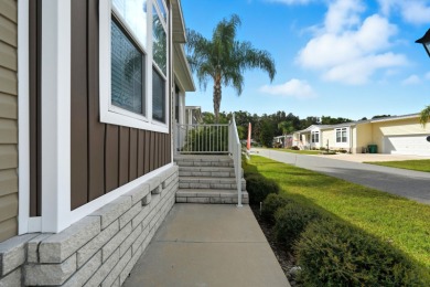 Welcome home to this beautifully maintained Breezeway Cottage on Water Oak Country Club Estates in Florida - for sale on GolfHomes.com, golf home, golf lot