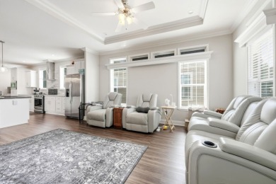 Welcome home to this beautifully maintained Breezeway Cottage on Water Oak Country Club Estates in Florida - for sale on GolfHomes.com, golf home, golf lot