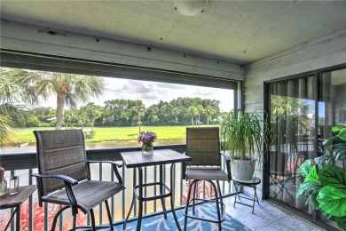 Step into paradise, this stunning 2B/2B luxury condo nestled in on Pelican Pointe 9 Hole Course in Florida - for sale on GolfHomes.com, golf home, golf lot