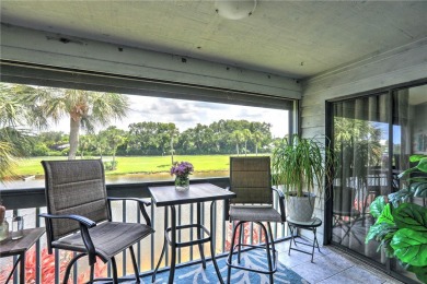 Step into paradise, this stunning 2B/2B luxury condo nestled in on Pelican Pointe 9 Hole Course in Florida - for sale on GolfHomes.com, golf home, golf lot
