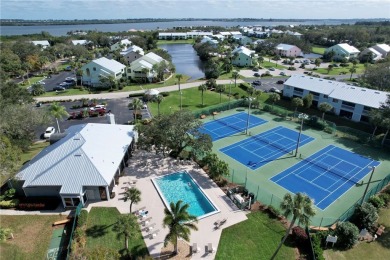 Step into paradise, this stunning 2B/2B luxury condo nestled in on Pelican Pointe 9 Hole Course in Florida - for sale on GolfHomes.com, golf home, golf lot