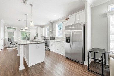 Welcome home to this beautifully maintained Breezeway Cottage on Water Oak Country Club Estates in Florida - for sale on GolfHomes.com, golf home, golf lot