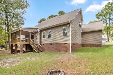 A Remarkable 4-Bedroom Home in Amenity-Rich Gated Community! on Carolina Lakes Country Club in North Carolina - for sale on GolfHomes.com, golf home, golf lot