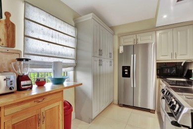 This two-bedroom, two-bathroom condominium offers approximately on Palm-Aire Country Club and Resort - Palms in Florida - for sale on GolfHomes.com, golf home, golf lot