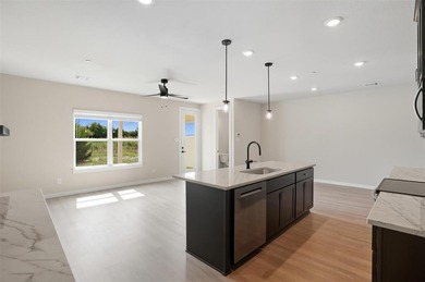 Welcome to resort-style, low-maintenance living in Heath's on Heath Golf and Yacht Club in Texas - for sale on GolfHomes.com, golf home, golf lot